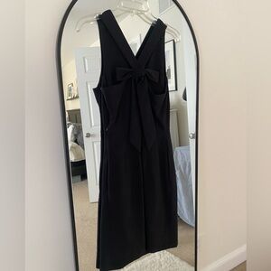 Adorable bow back, V neck and back dress with side zipper closure